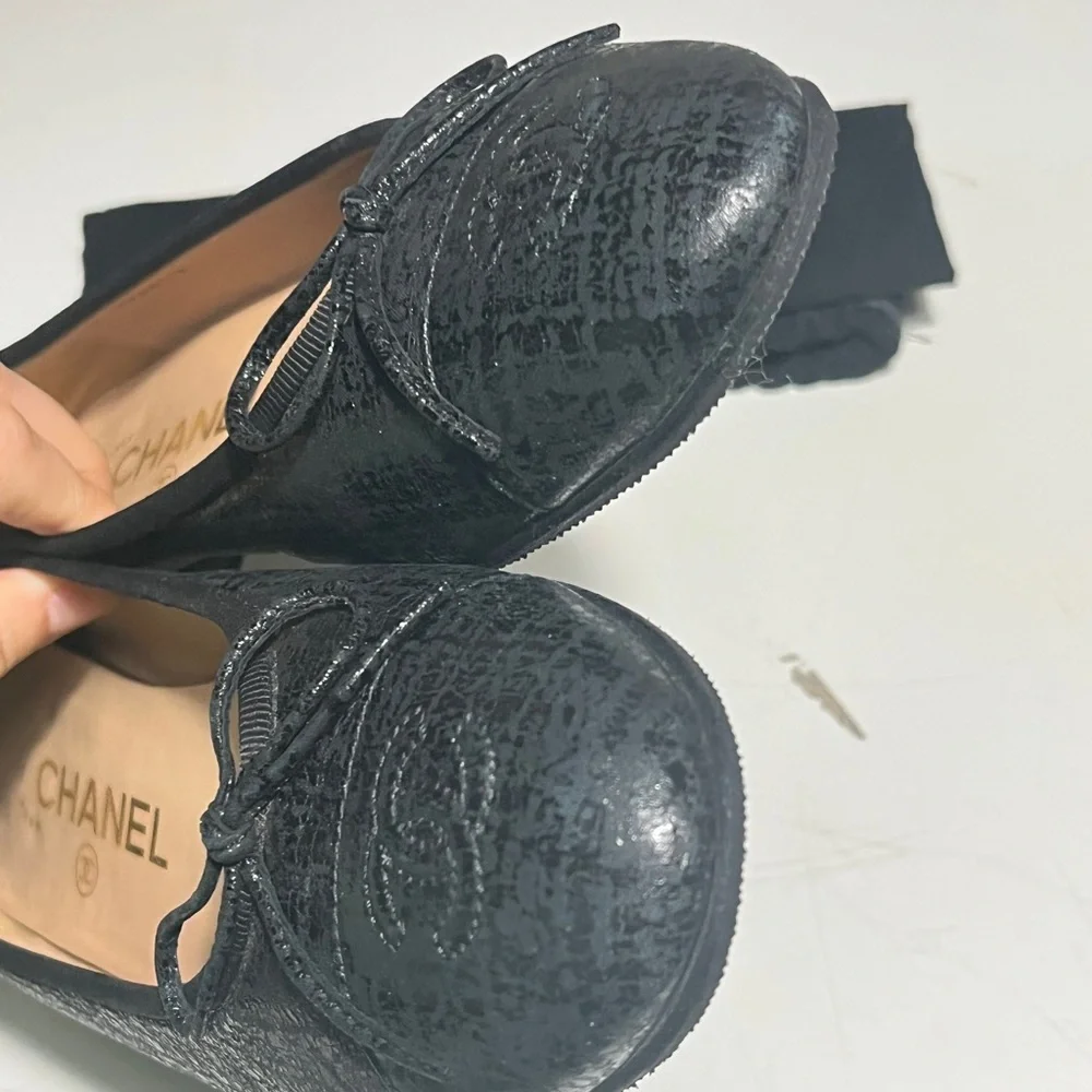 CHANEL Textured Black Loafers